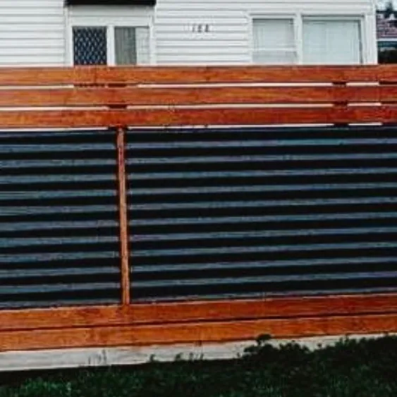 Wood and metal pool fence providing both security and style